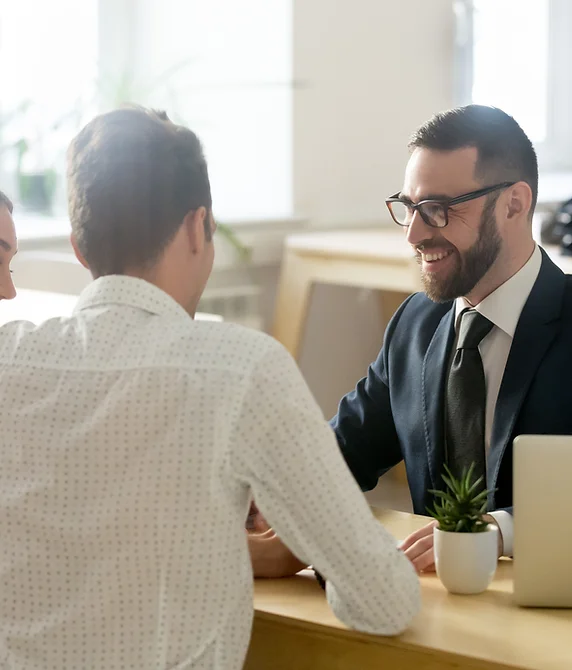 Peter in a confidential conversation with a client
